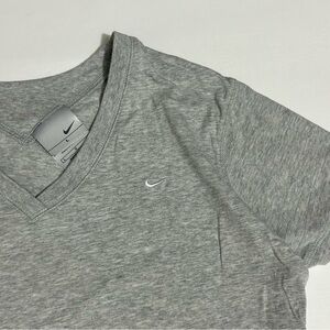 Nike women’s Size M/L Light Grey Tee w/ swoosh